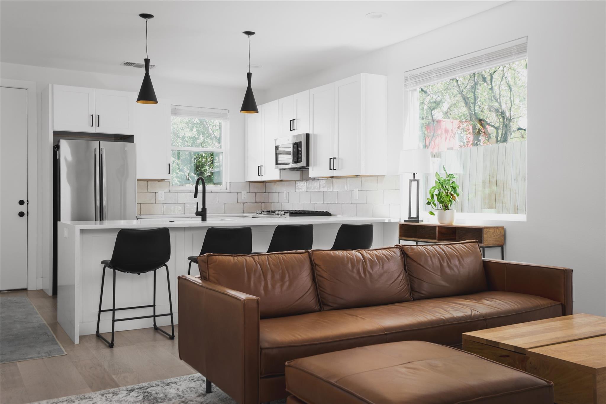Gleaming hardwood floors and a spacious kitchen i