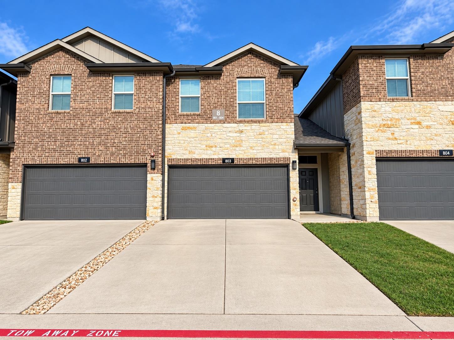 Multi-textured brick and stone elevations pair wi