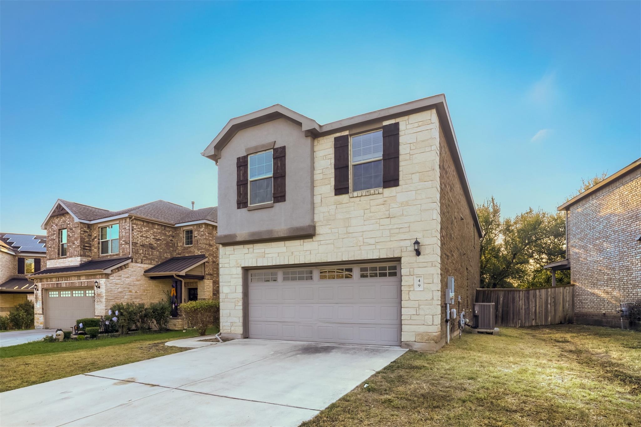 A classic stone and stucco exterior welcomes you 