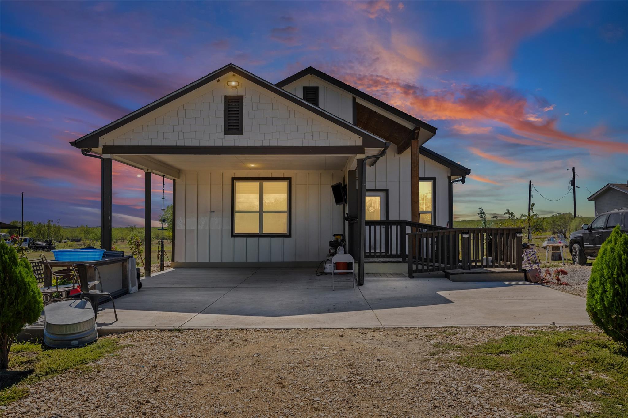 An inviting exterior displays board and batten si