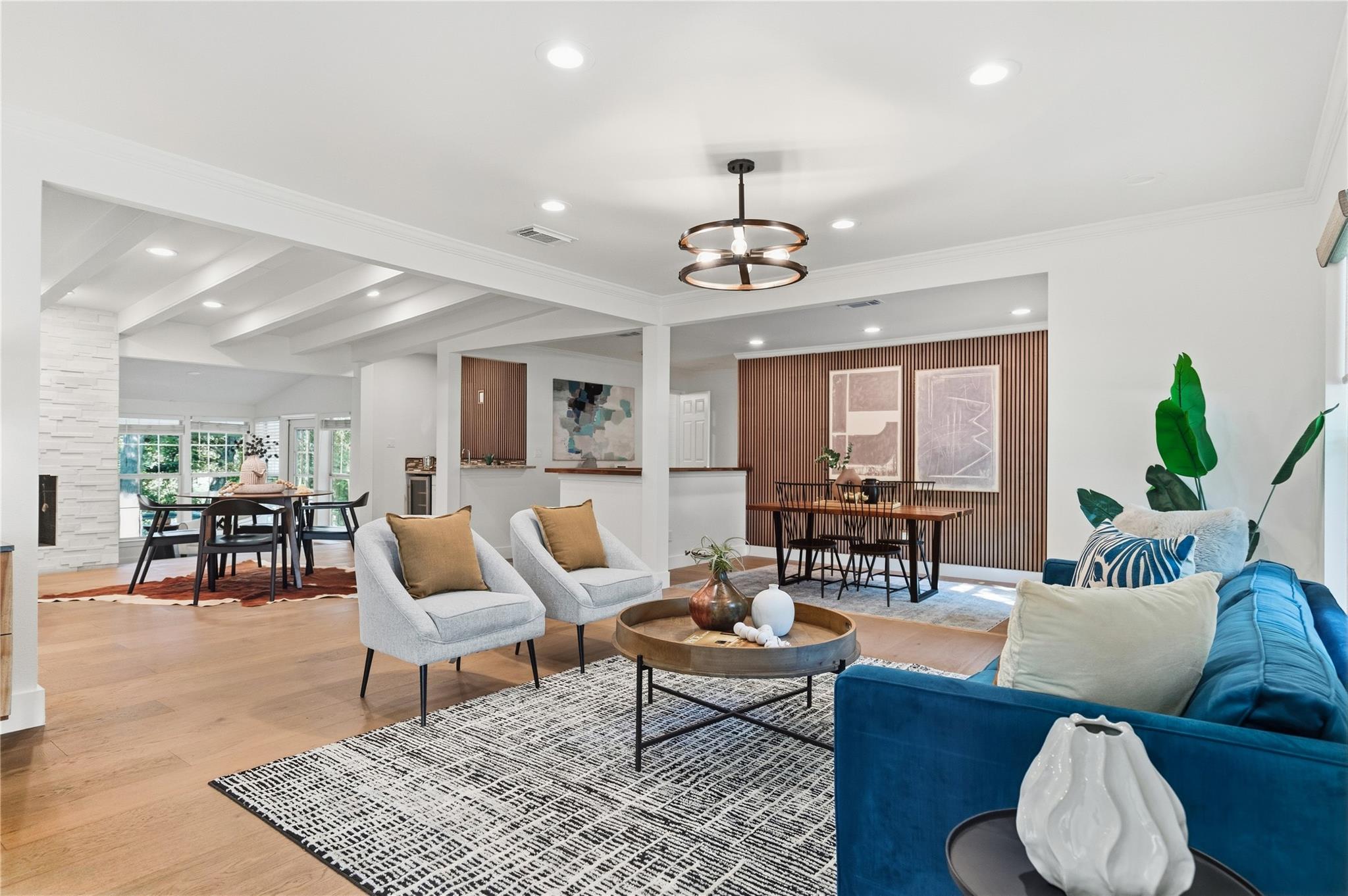 Hardwood floors and recessed lighting enhance thi