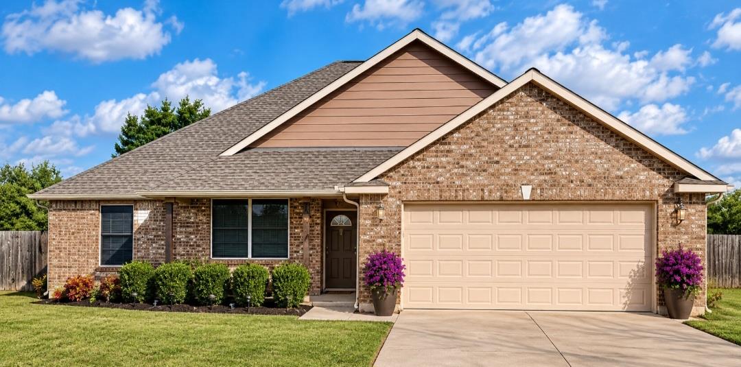 Classic brick exterior showcases prominent gables
