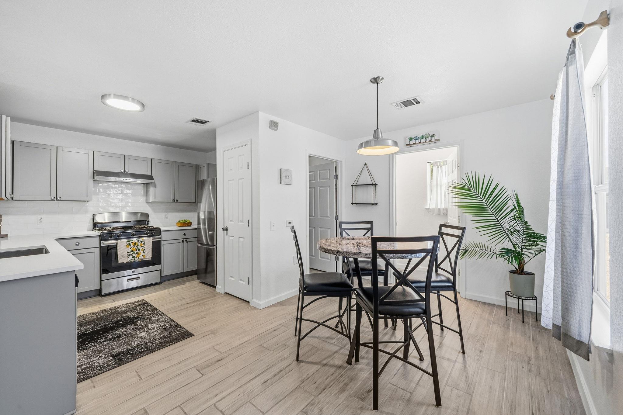 Gleaming stone counters and modern flooring eleva