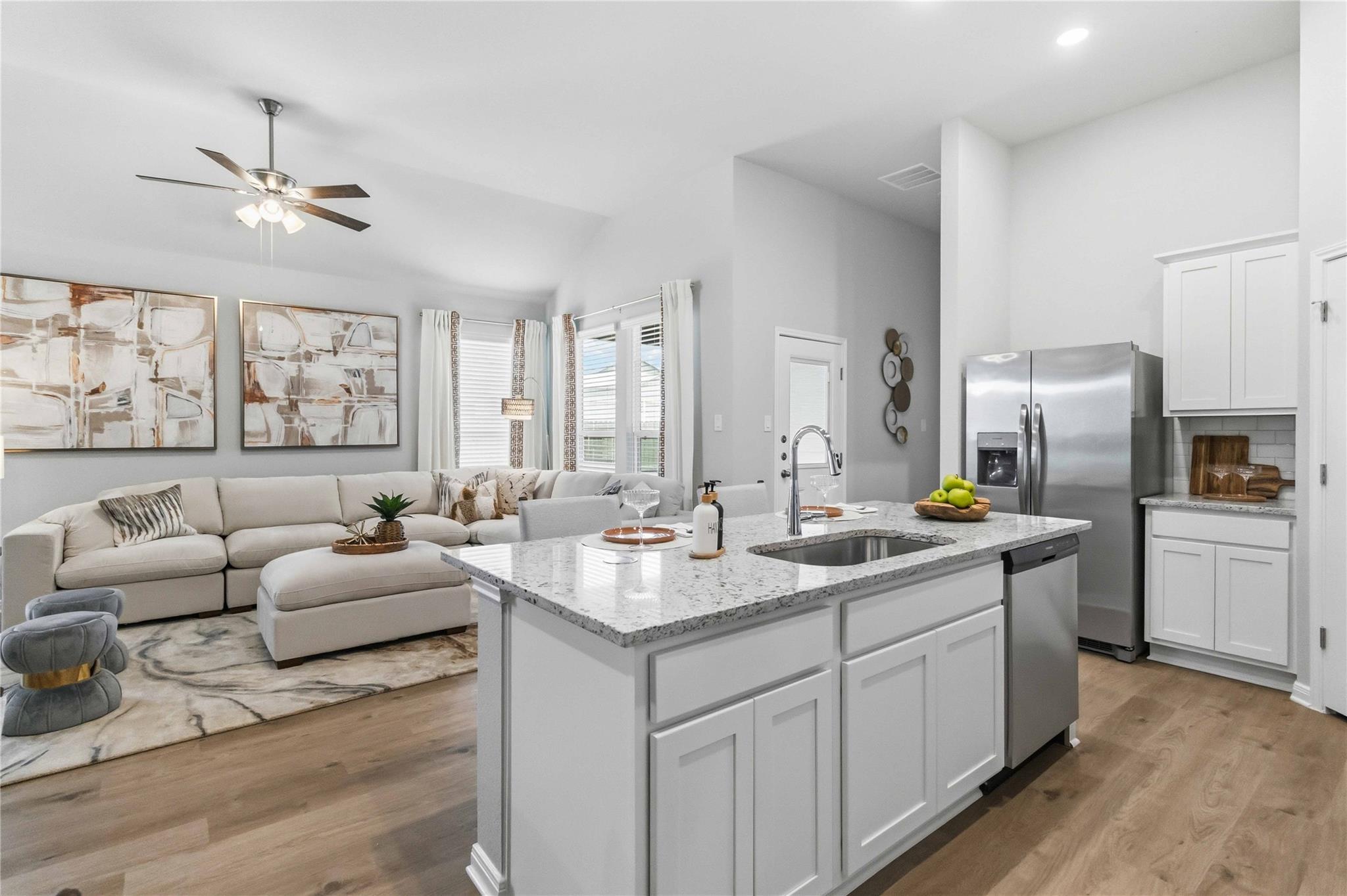 An open-concept living area connects seamlessly t