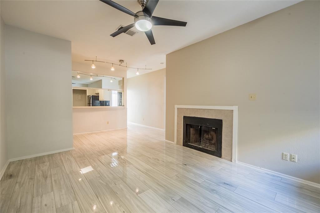 Gleaming wood-look tile floors and a classic tile