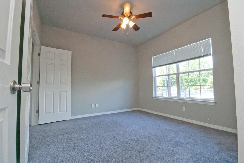 Natural light pours through a large window over c
