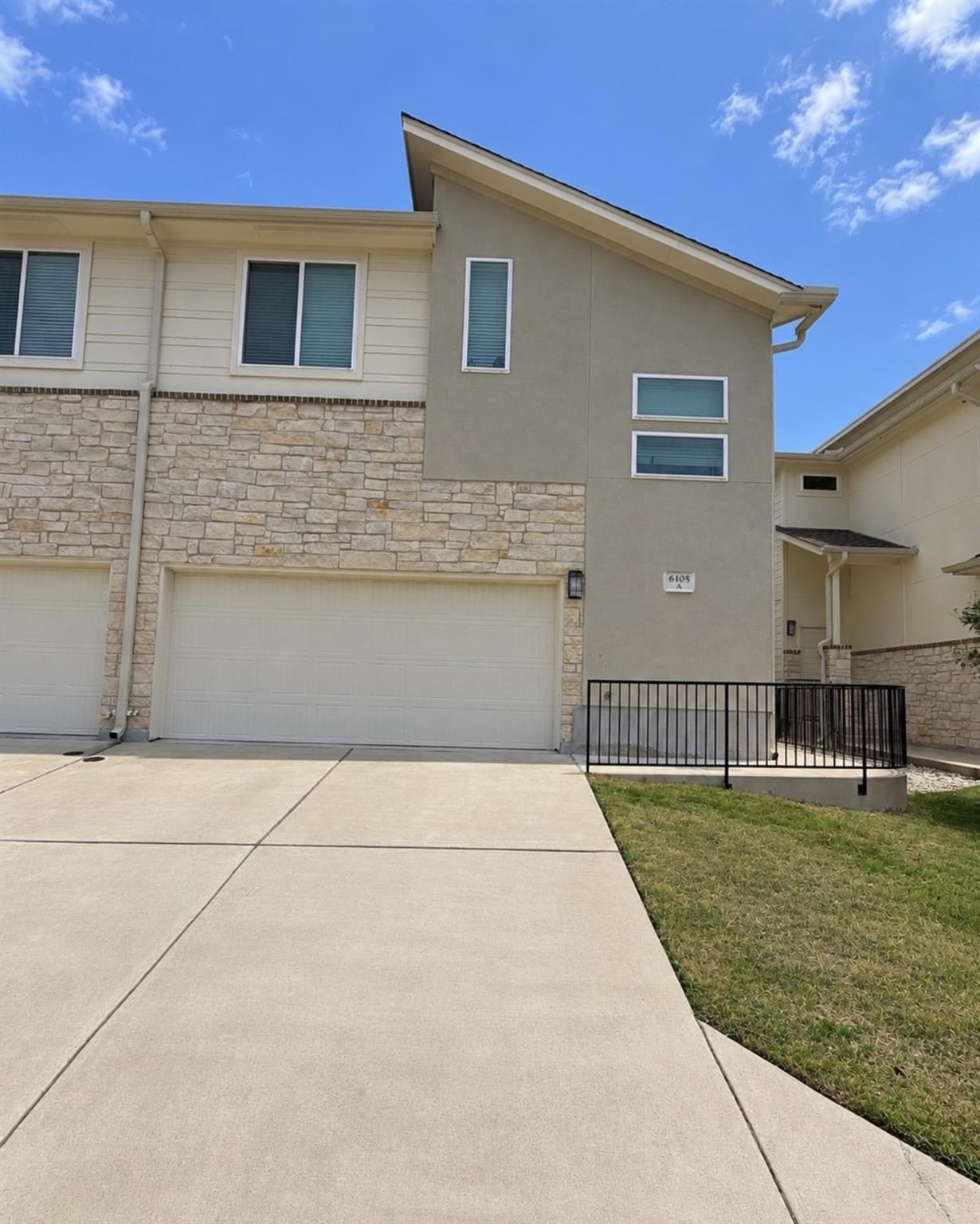 Clean lines and a blend of stone and stucco accen