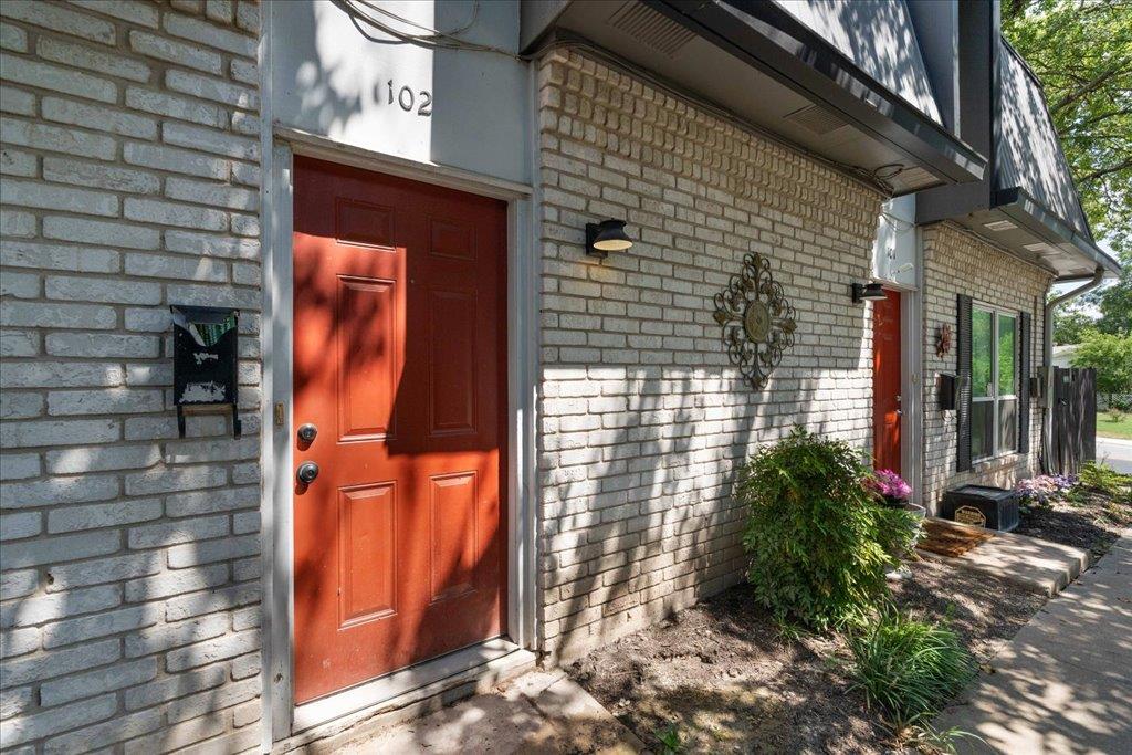 An inviting brick facade sets a classic tone for 