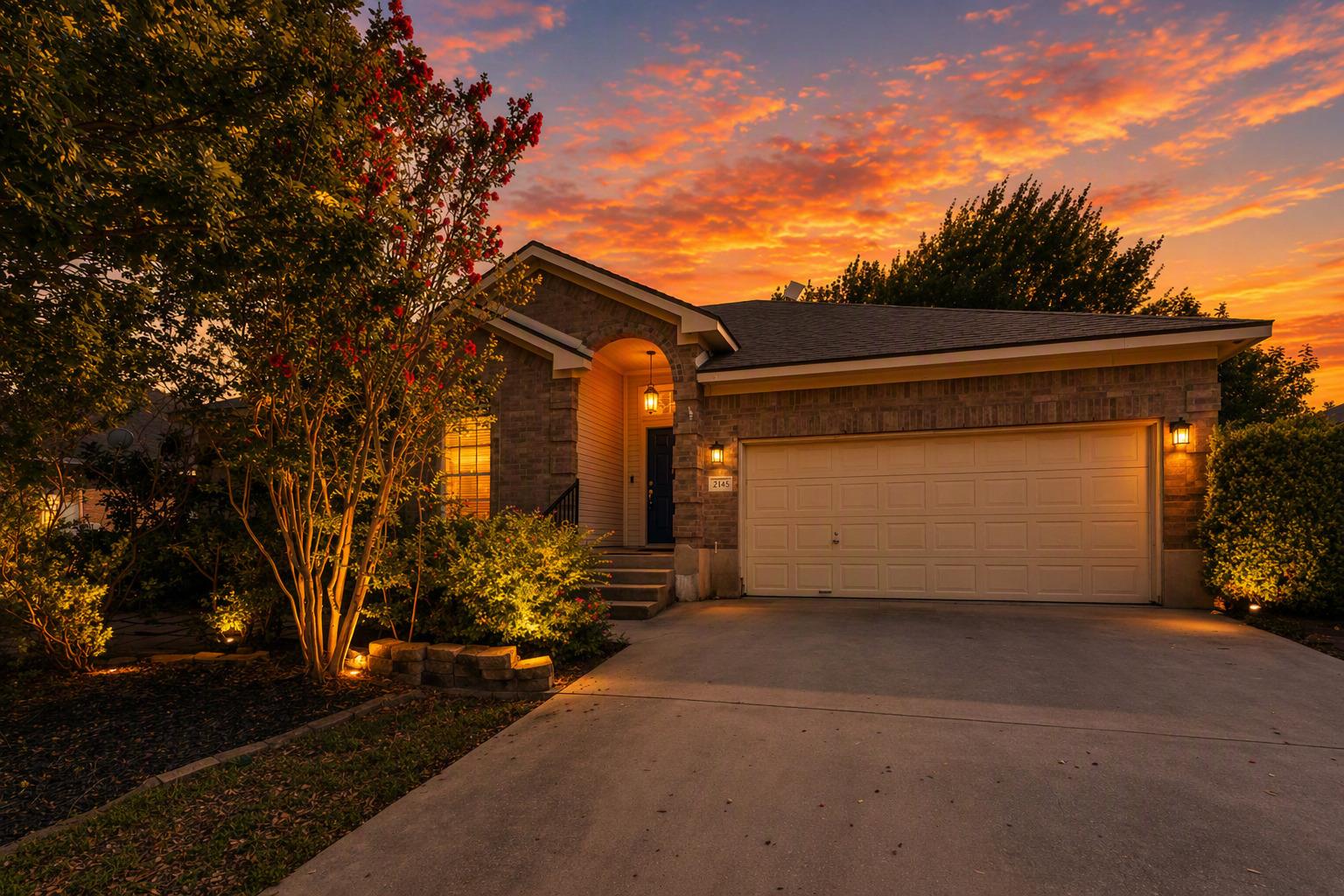An inviting entry and well-manicured landscaping 