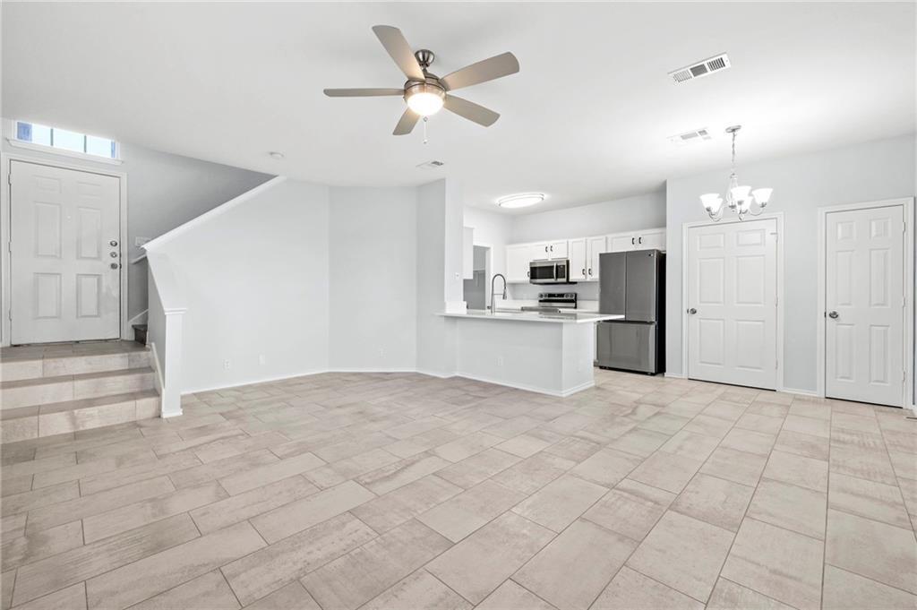 An open main floor seamlessly connects the living