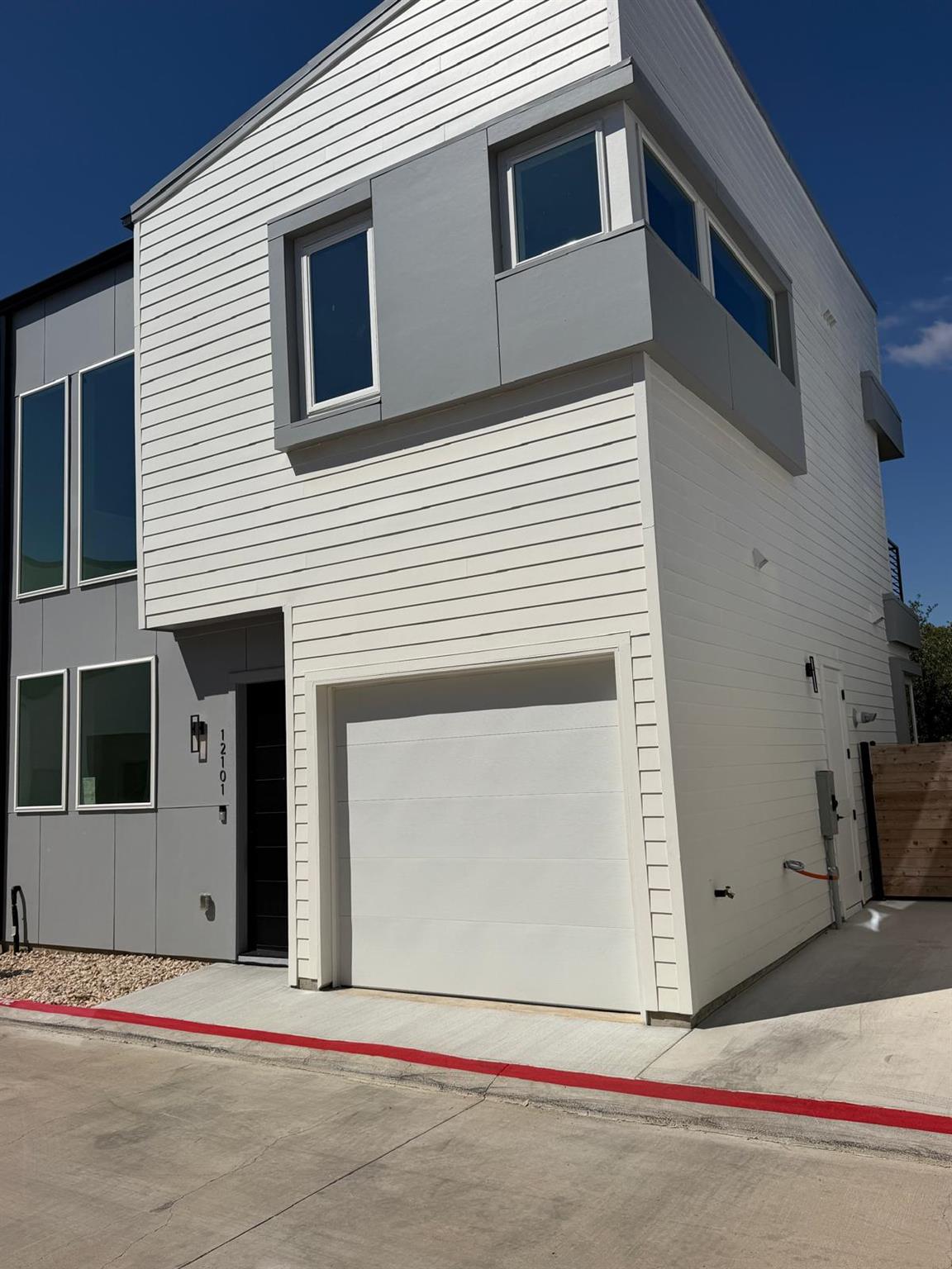 Modern architectural lines and a private garage d