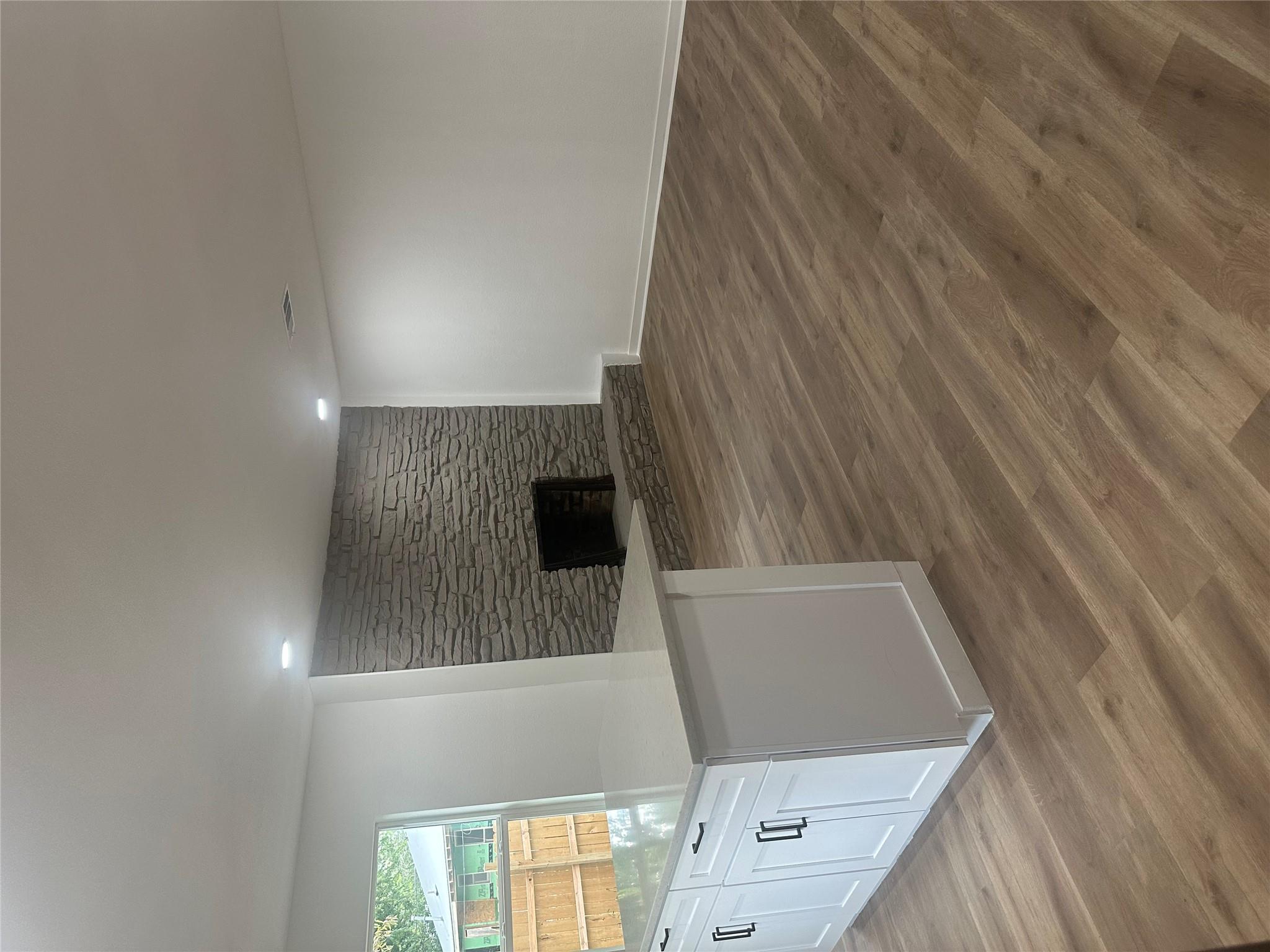 An open floorplan integrates the versatile living