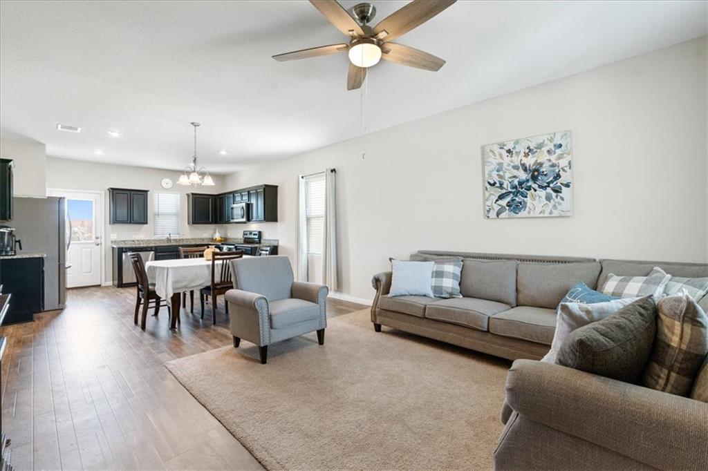 An open floorplan seamlessly connects the living 