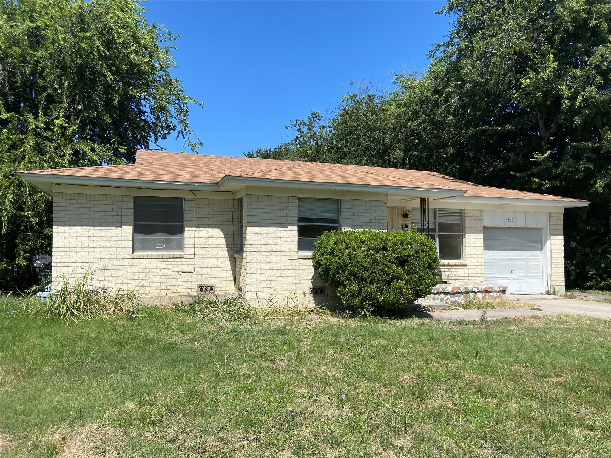 Classic brick exterior highlights this single-sto