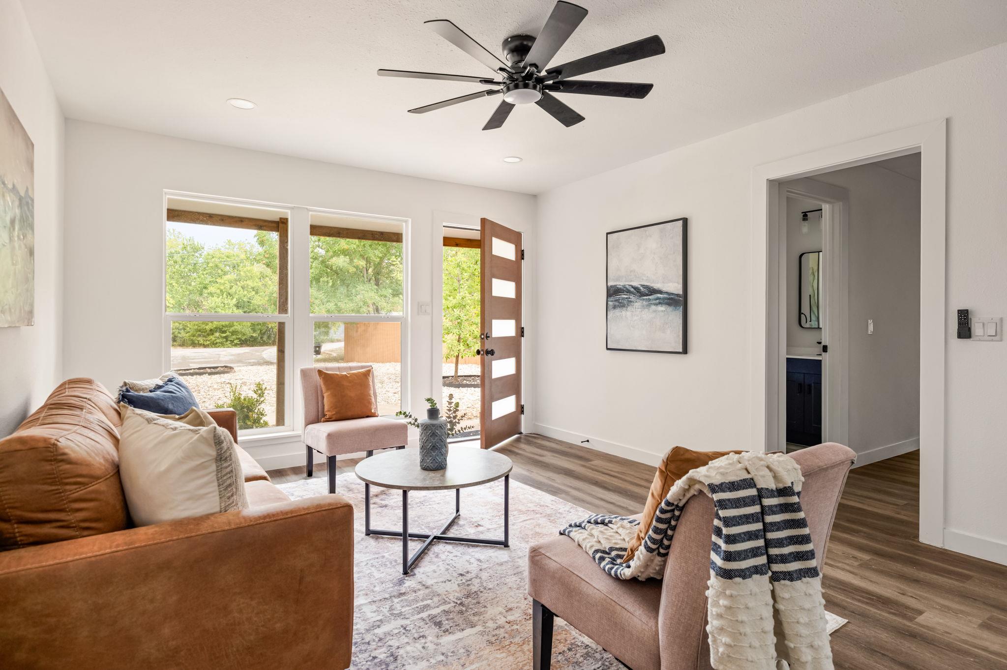 An inviting entryway flows directly into a bright