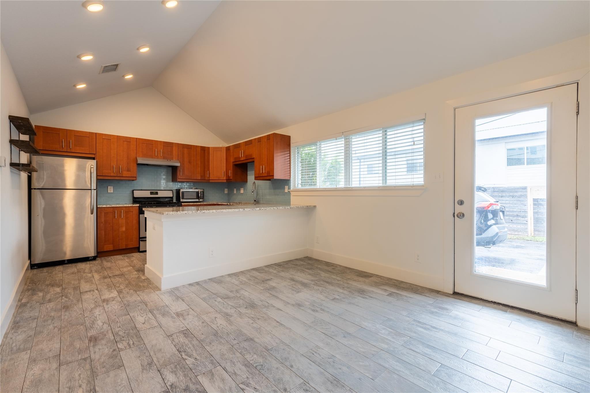 An open floorplan connects the casual dining area
