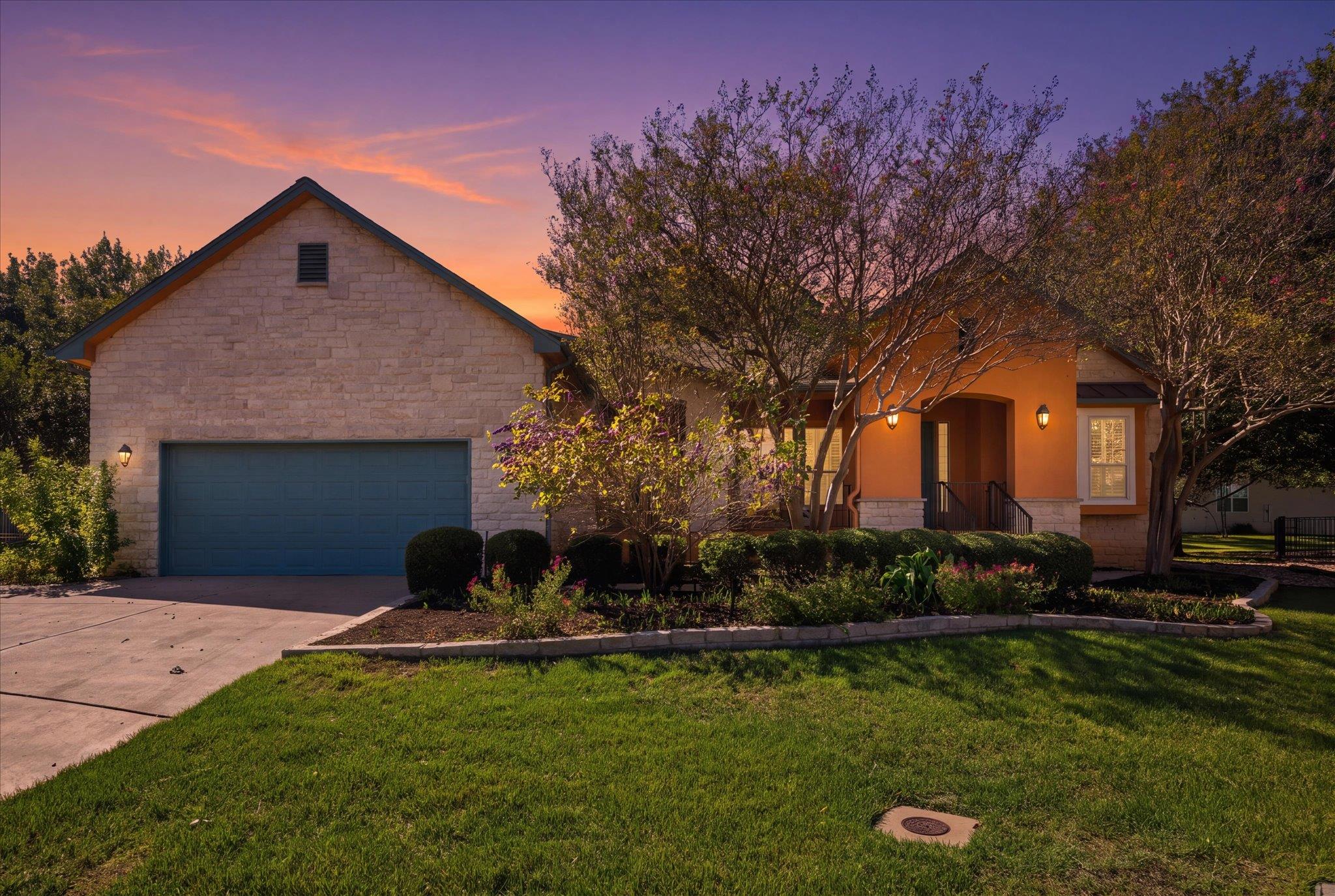 A stone and stucco facade frames the inviting fro