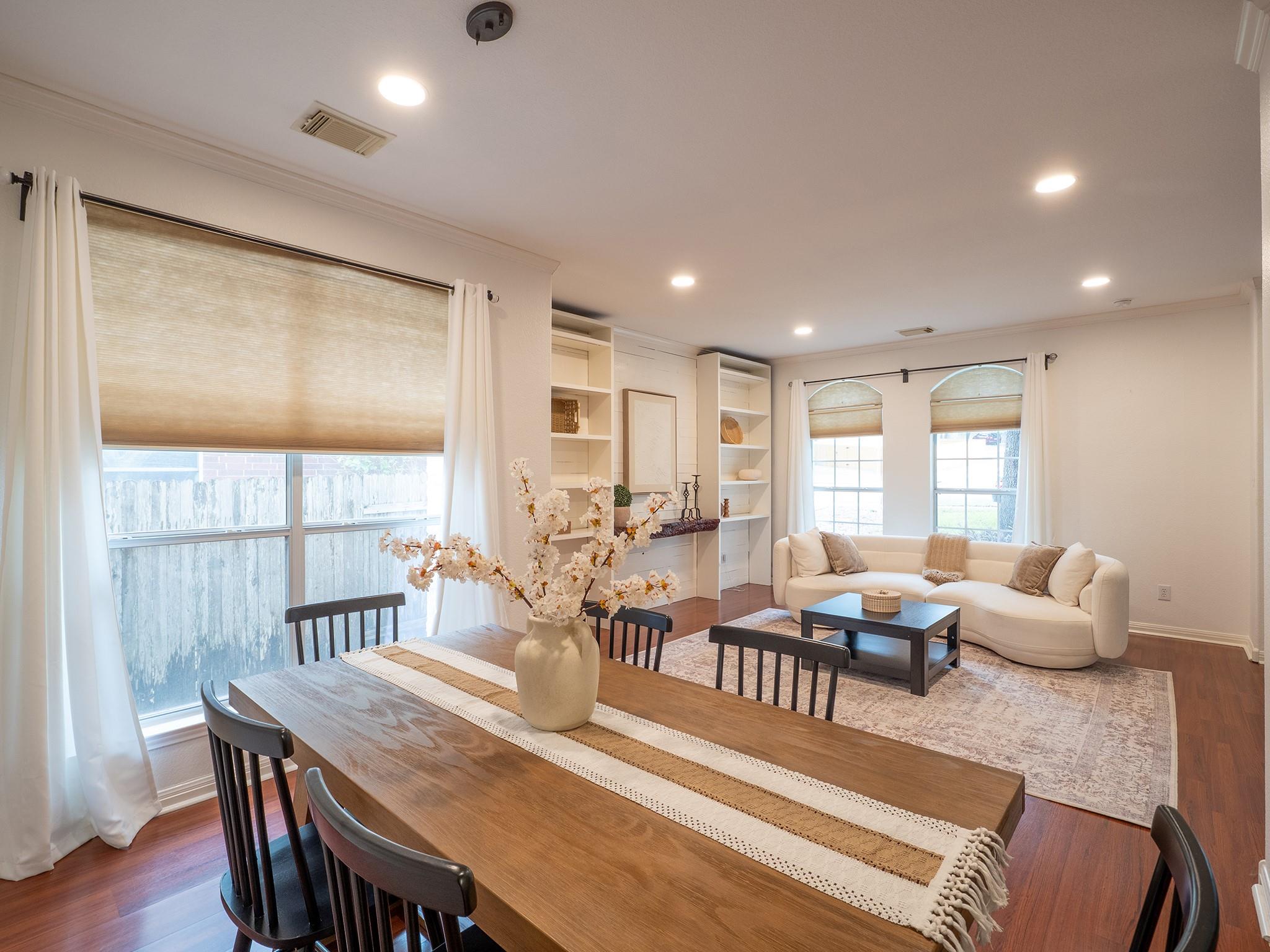 Gleaming hardwood floors and classic crown moldin