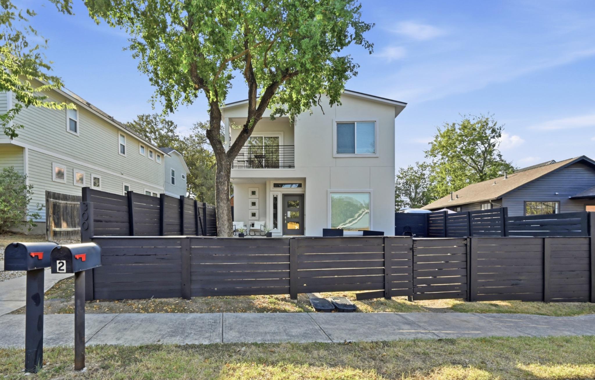 Modern architectural lines define this two-story 