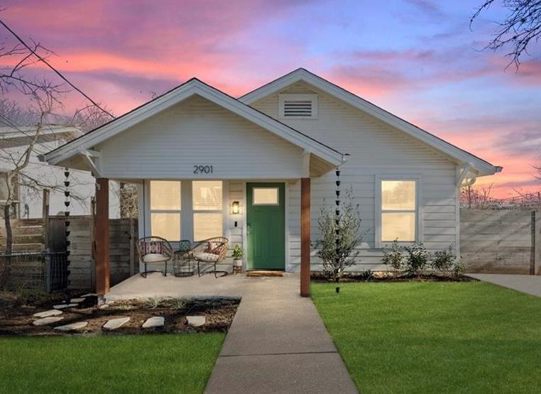A welcoming front porch with classic wooden posts