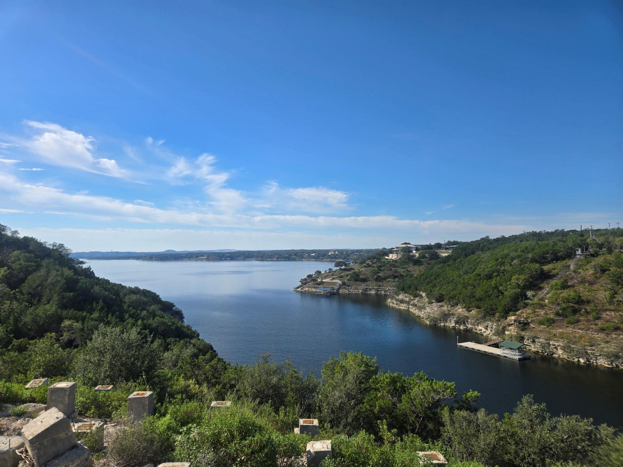Vast water panoramas stretch out under clear blue