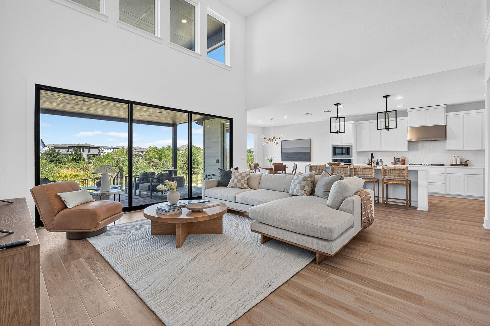 Towering ceilings and massive sliding glass doors