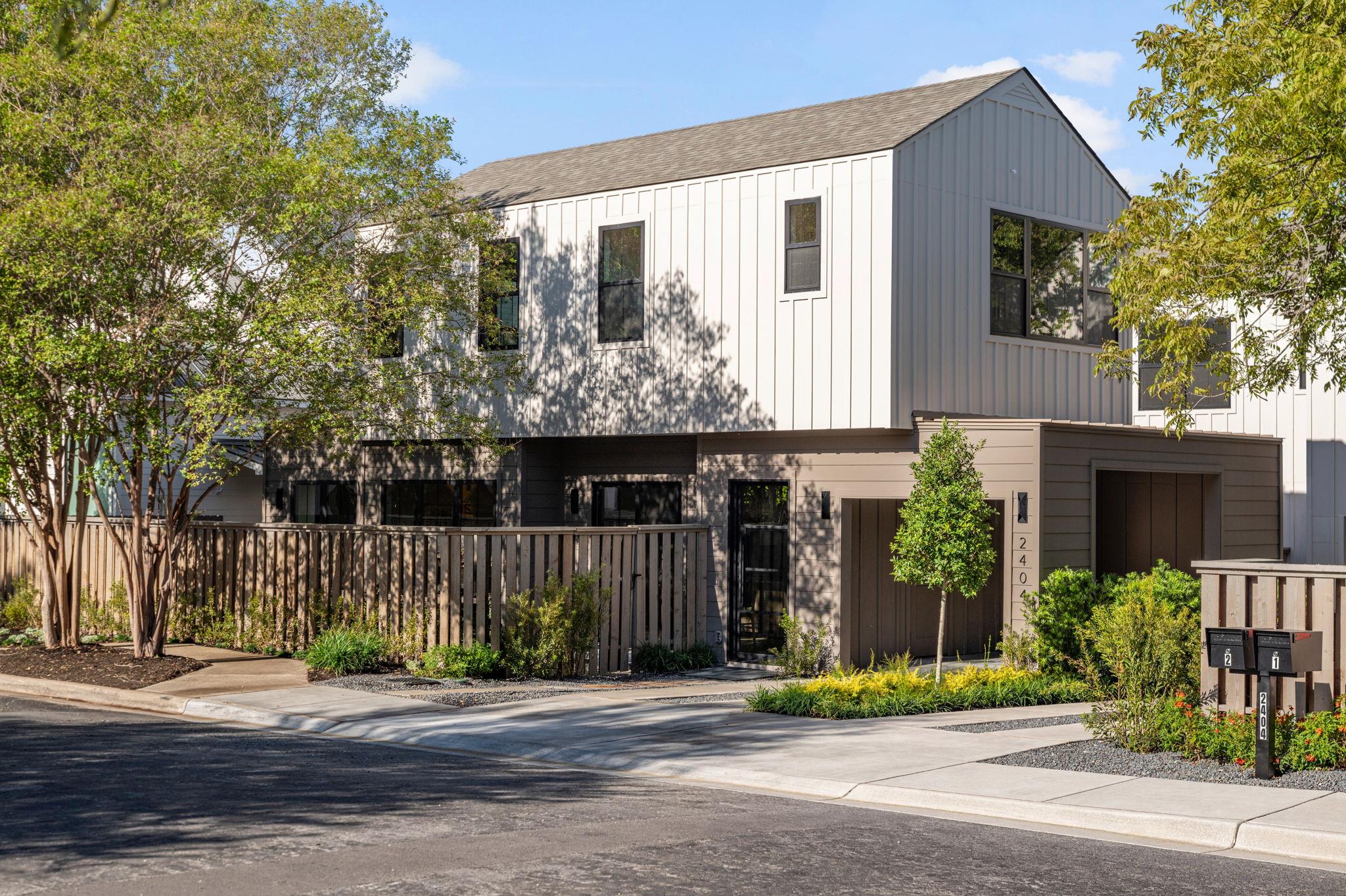 Clean lines and vertical siding define this conte