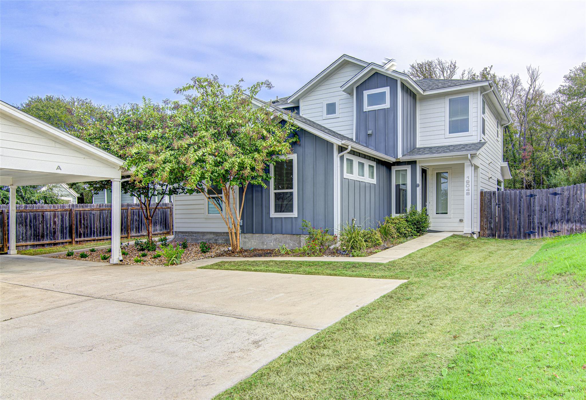 Board and batten siding pairs with crisp white tr