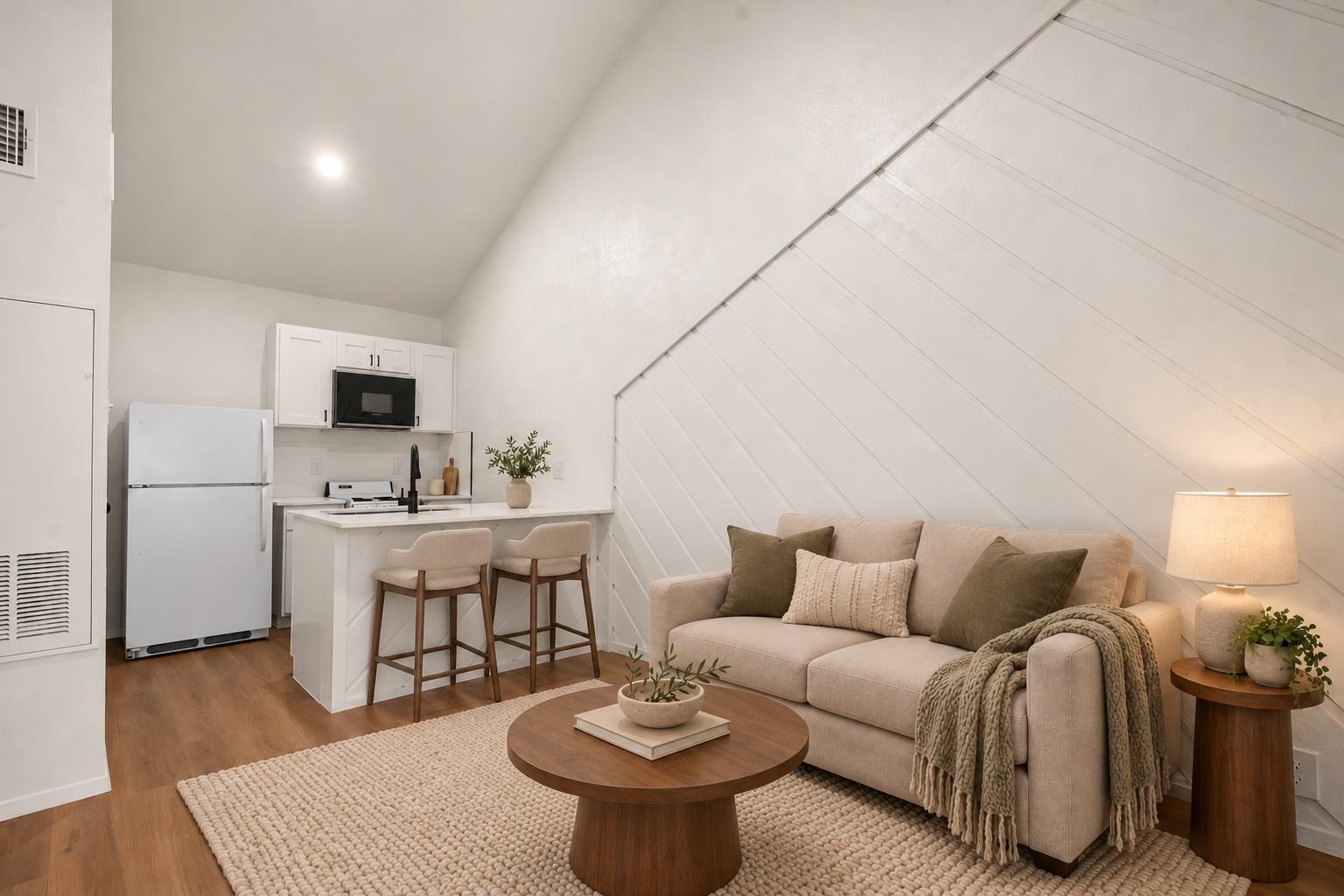 Angled paneled walls and soaring ceilings define 