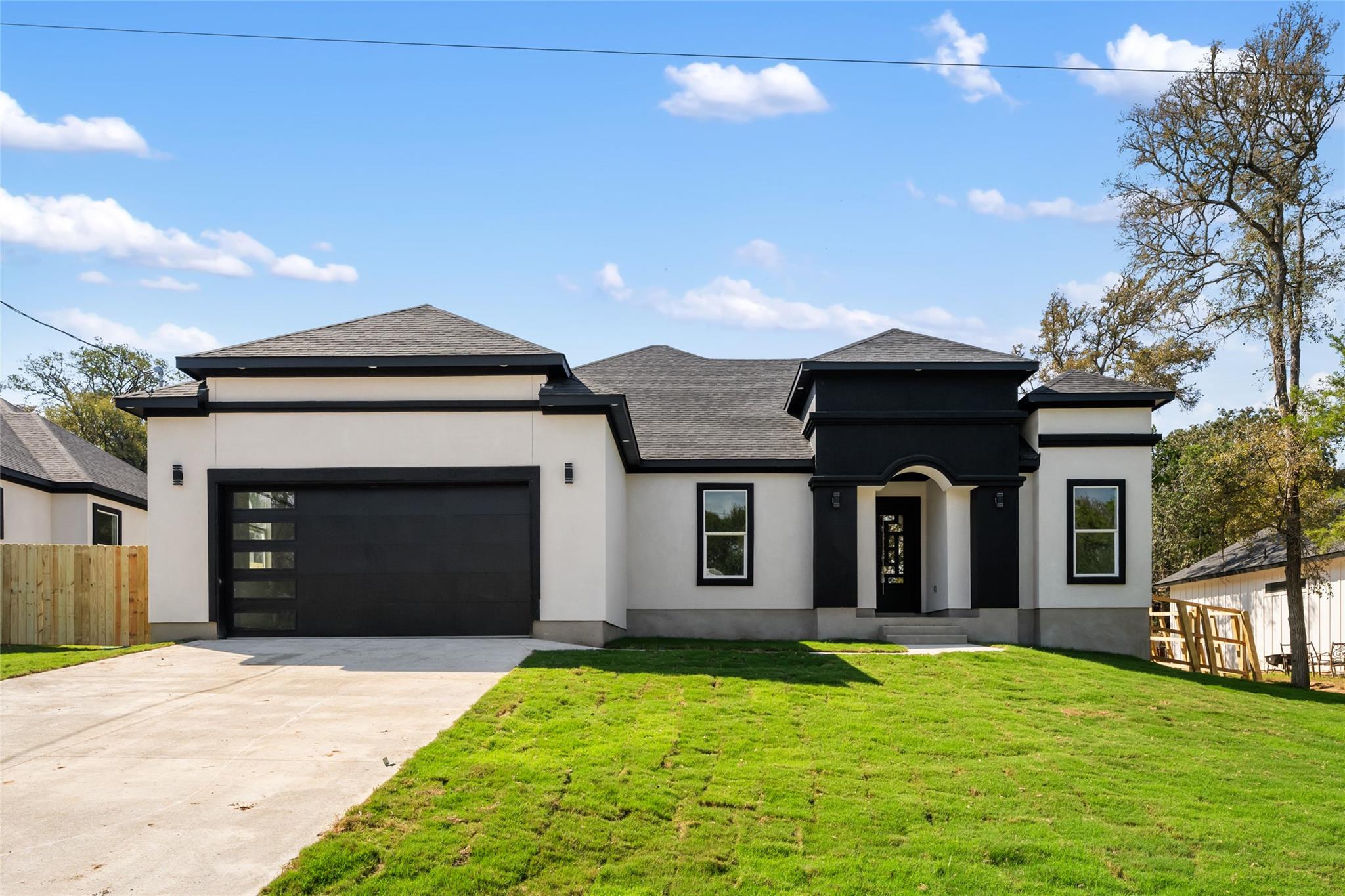 Clean lines and modern exterior finishes define t