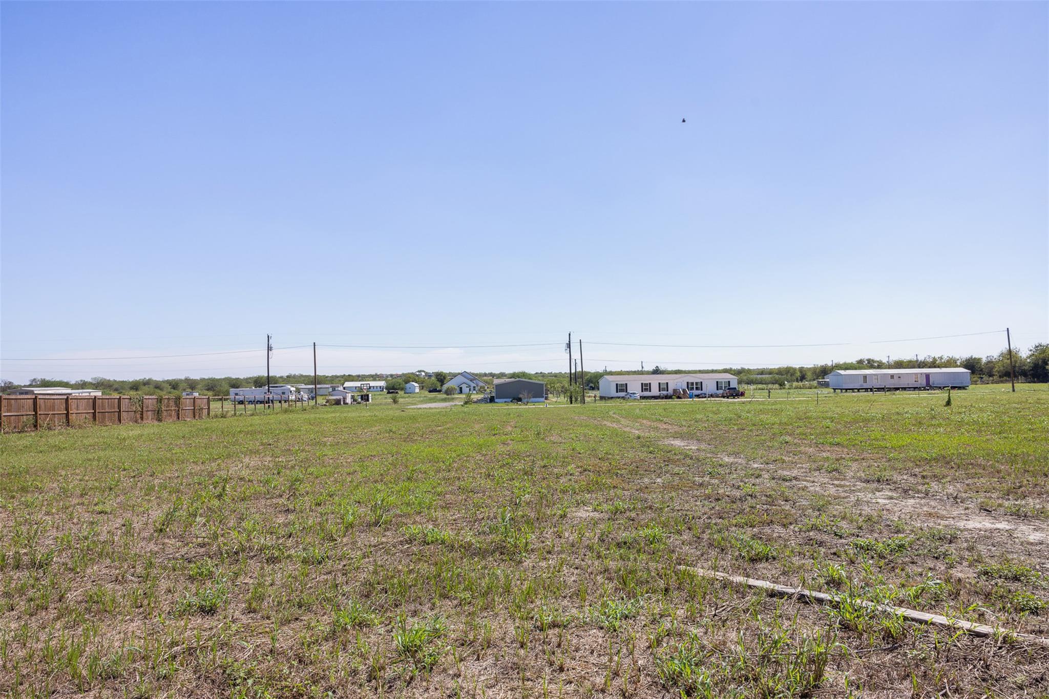 A spacious grassy pasture offers vast open space 