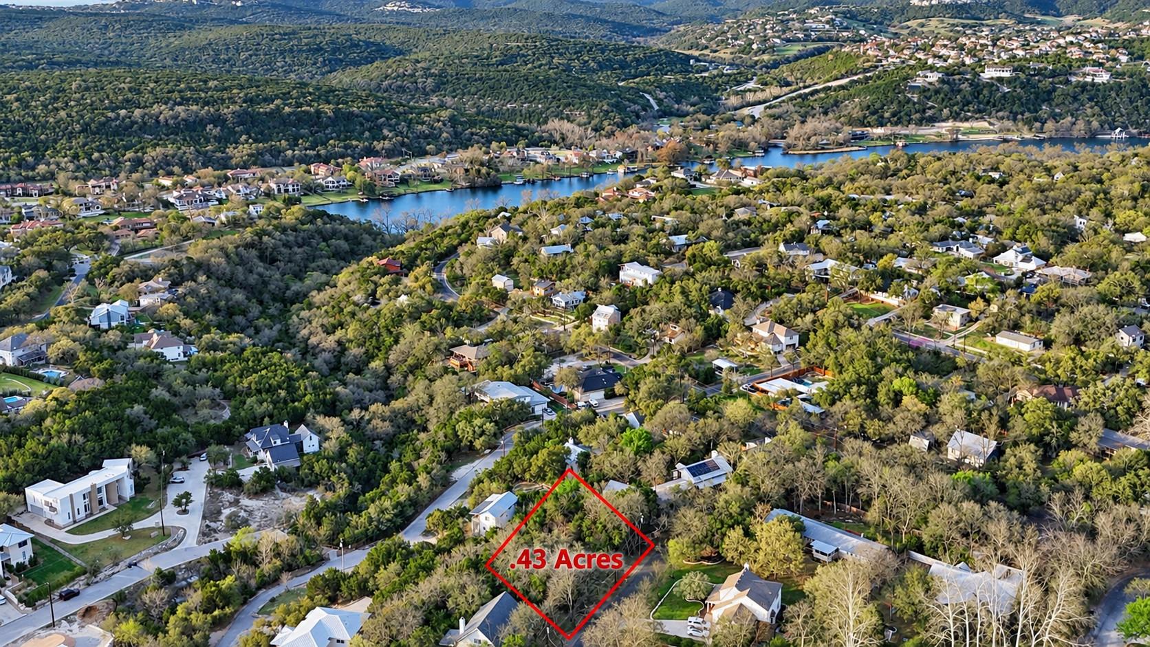 Rolling hills and mature trees frame this scenic 