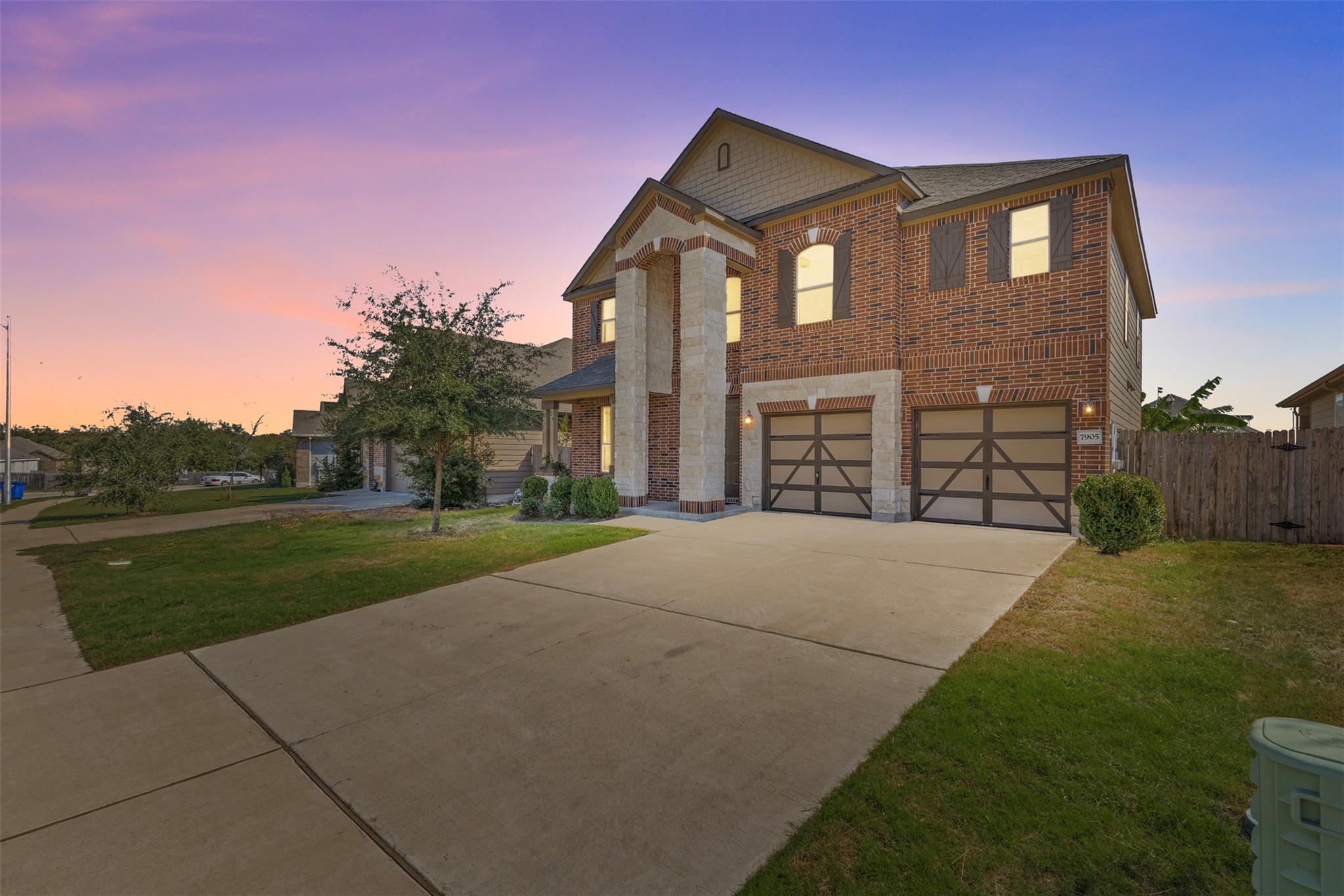 A classic brick exterior with stone pillars frame
