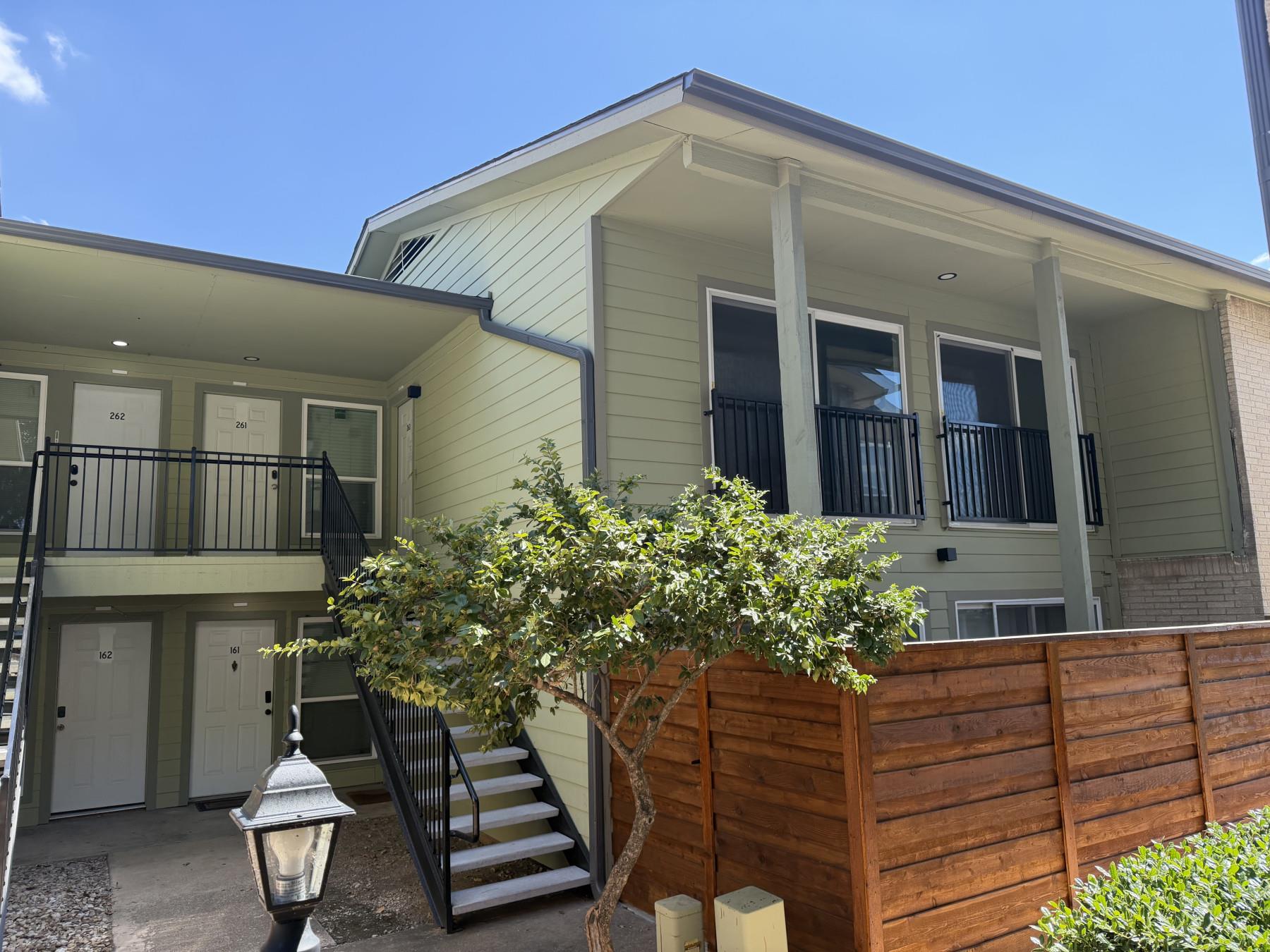Multi-level modern residential architecture featu
