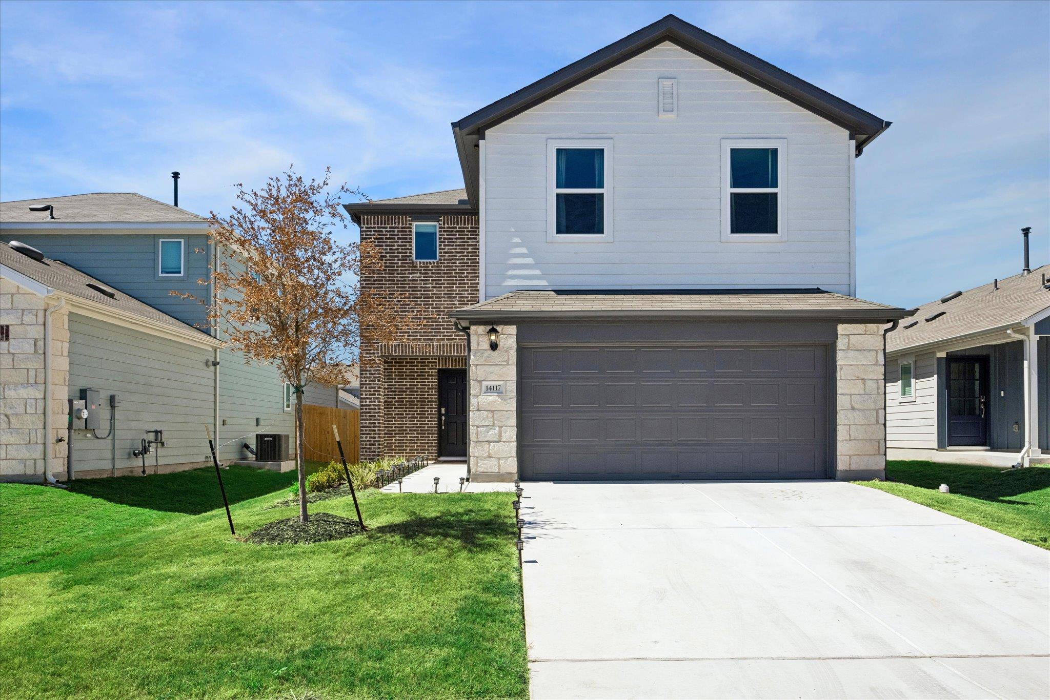 A classic two-story exterior showcases a balanced