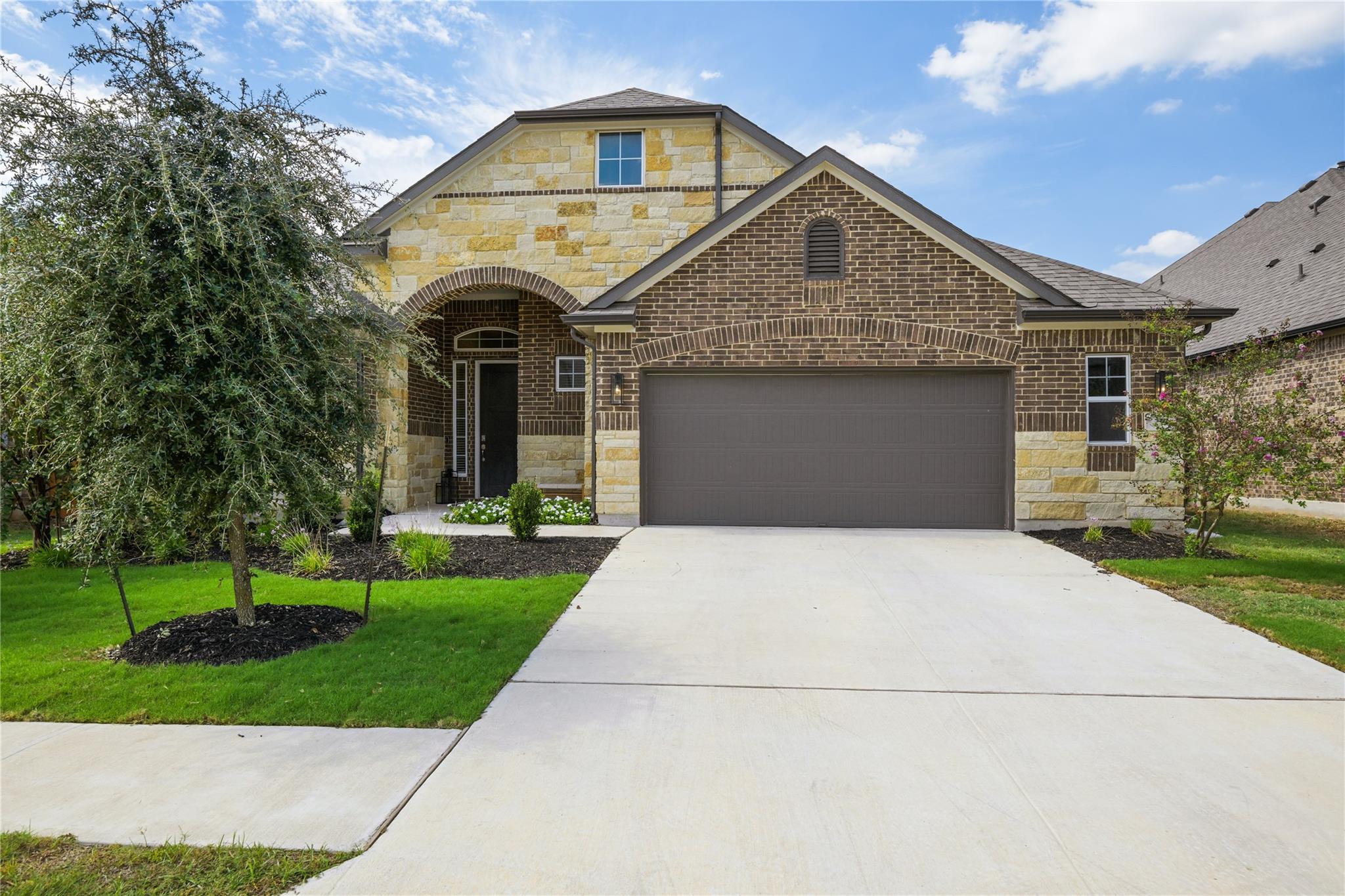 Stone and brick detailing highlights the exterior