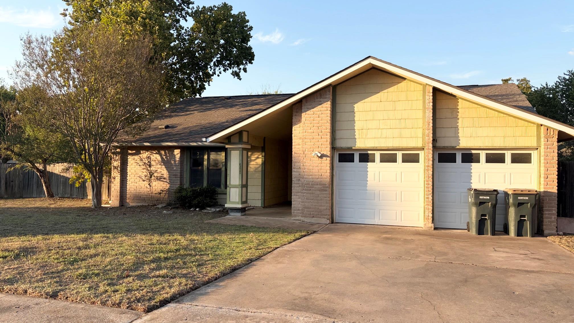 Classic brick and siding architecture defines thi
