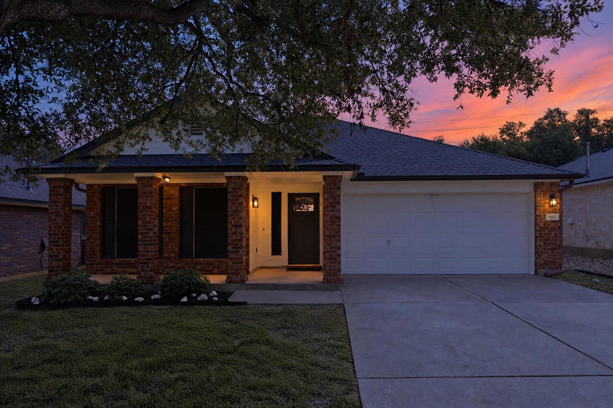 A classic brick exterior and welcoming front porc