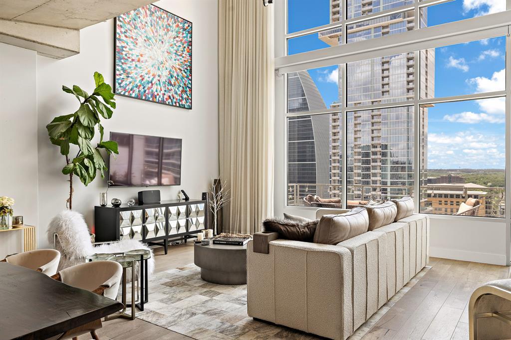 Towering floor-to-ceiling windows frame dramatic 