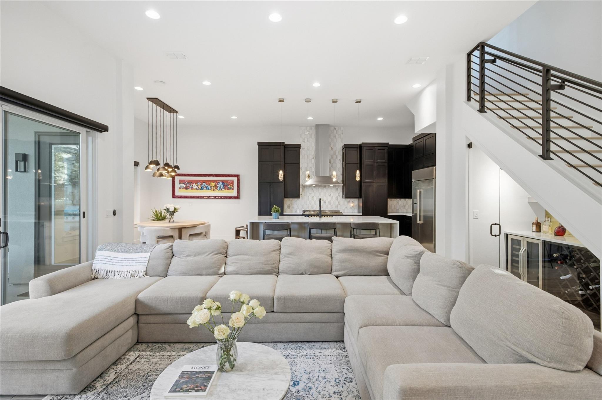 An airy open-concept layout connects the main liv
