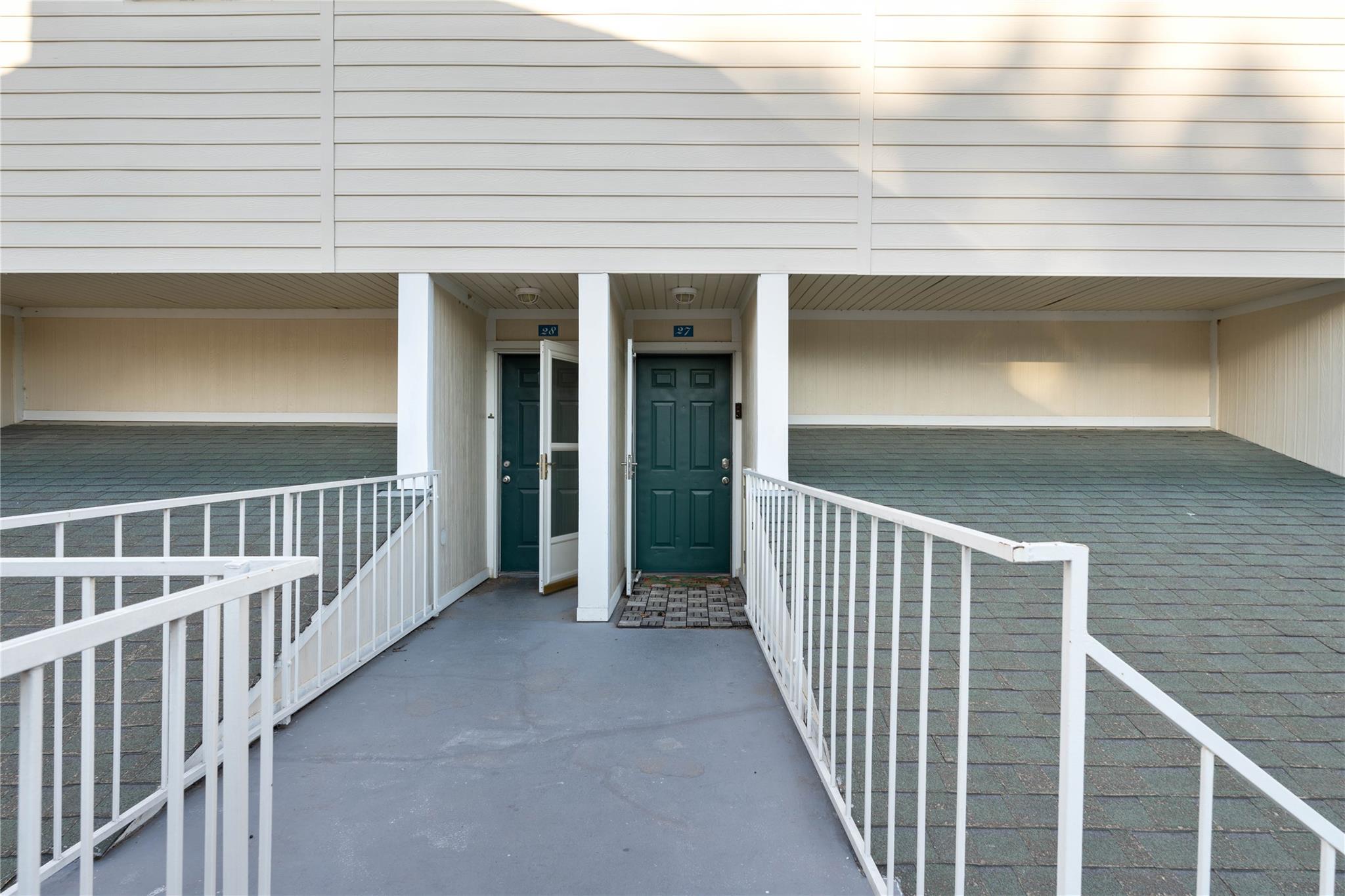 A secure walkway leads directly to the private en