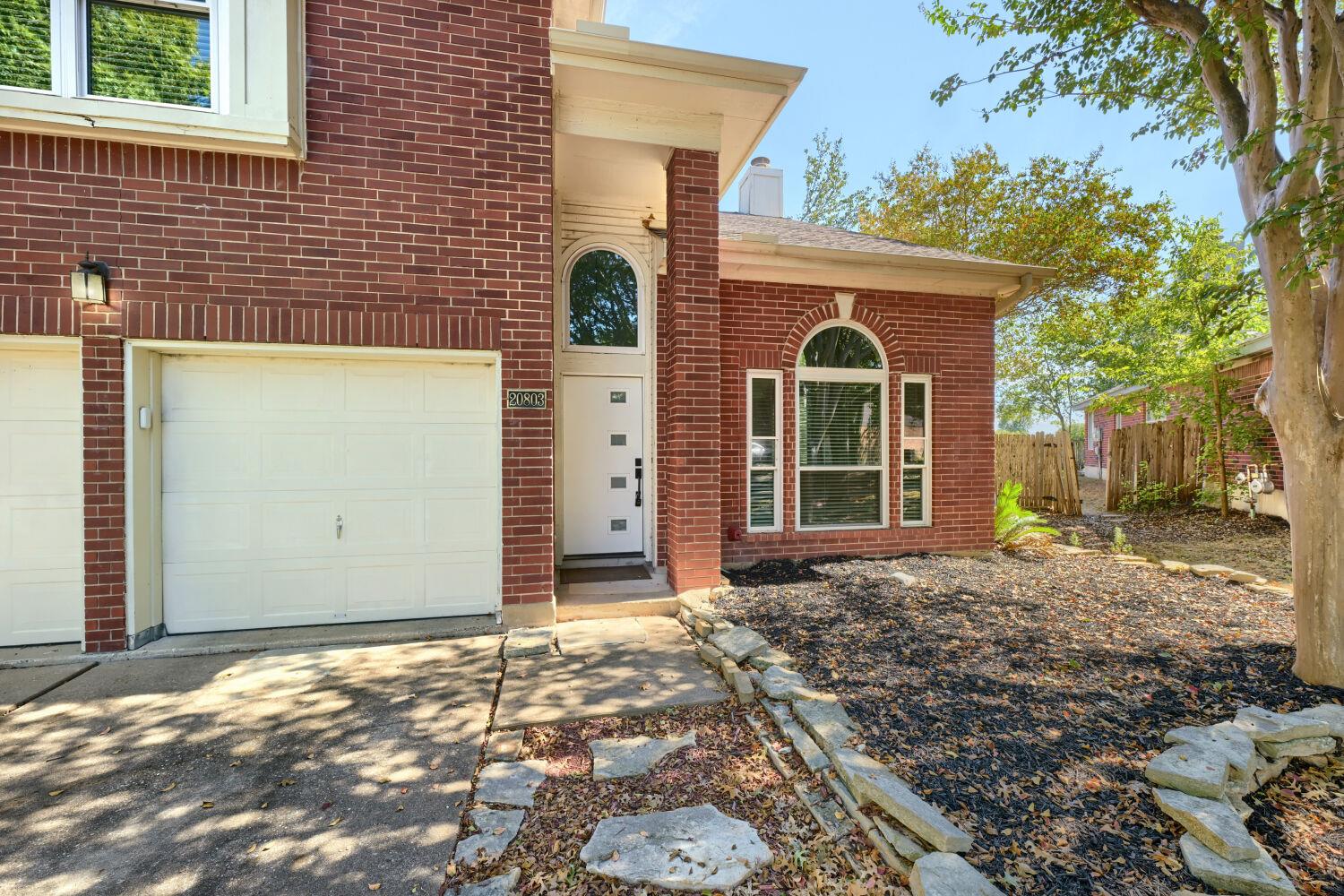 Classic brick exterior highlights the front facad