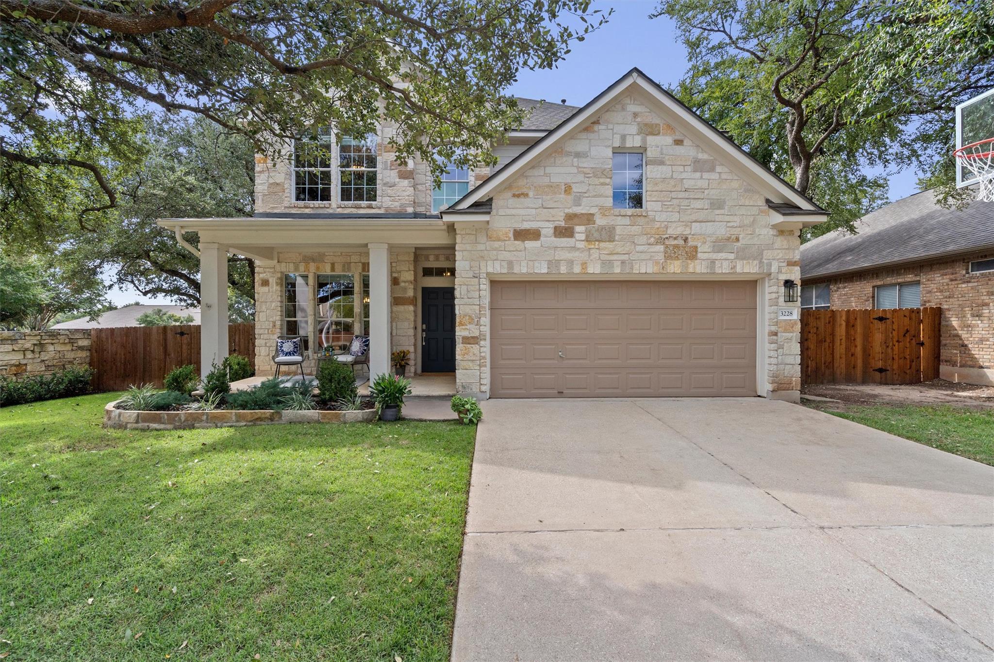 Natural stone masonry creates a timeless exterior