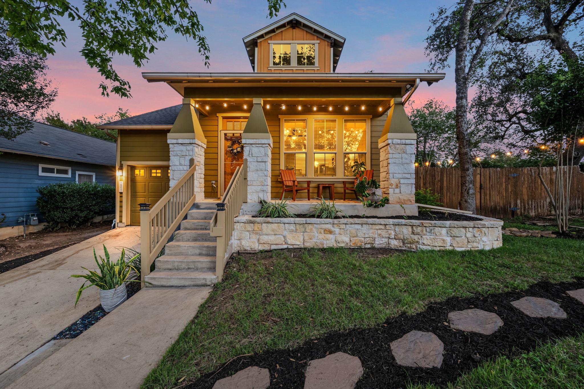 Craftsman architectural details frame a welcoming