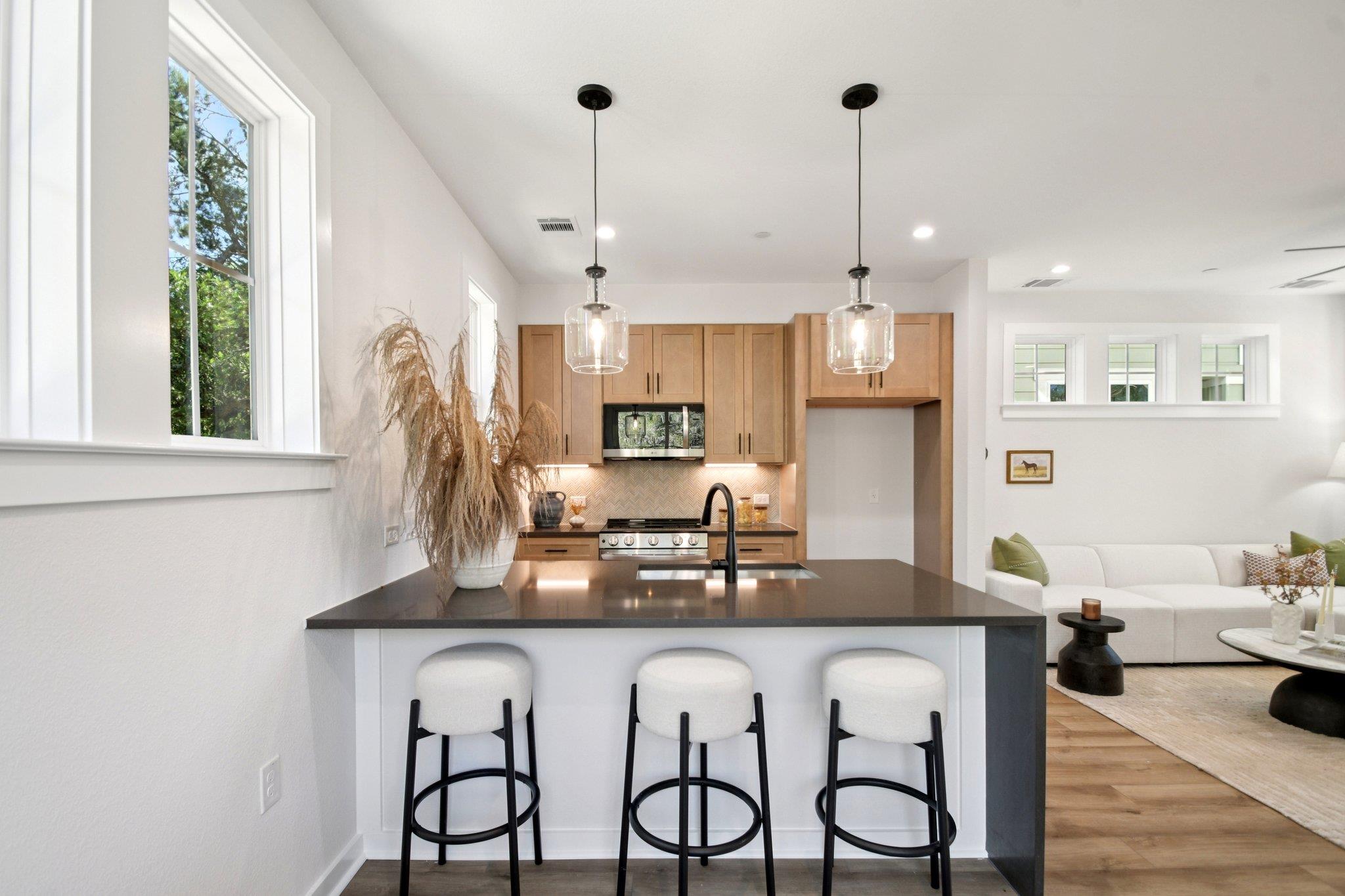 A modern kitchen breakfast bar seamlessly connect