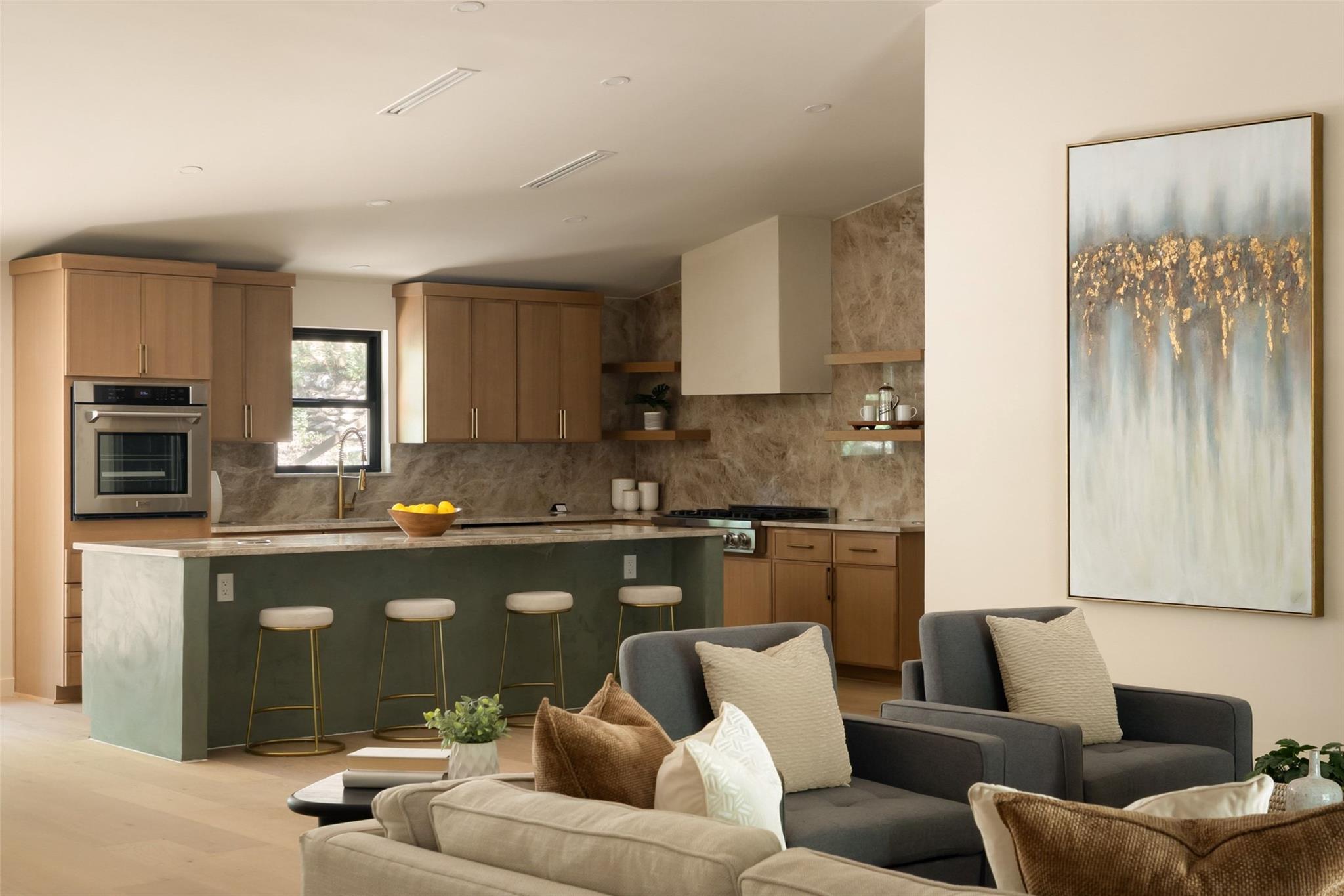 An open-concept living area seamlessly connects t