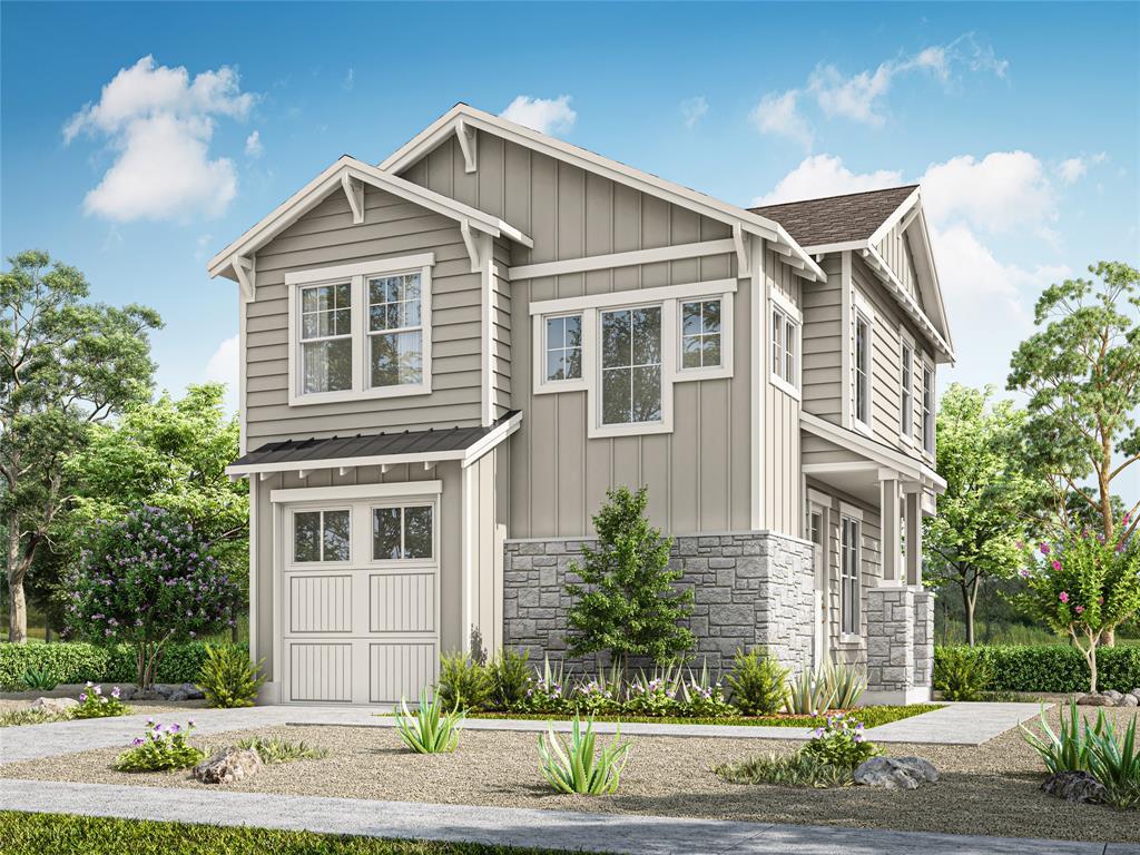 Board and batten siding pairs with rugged stone a