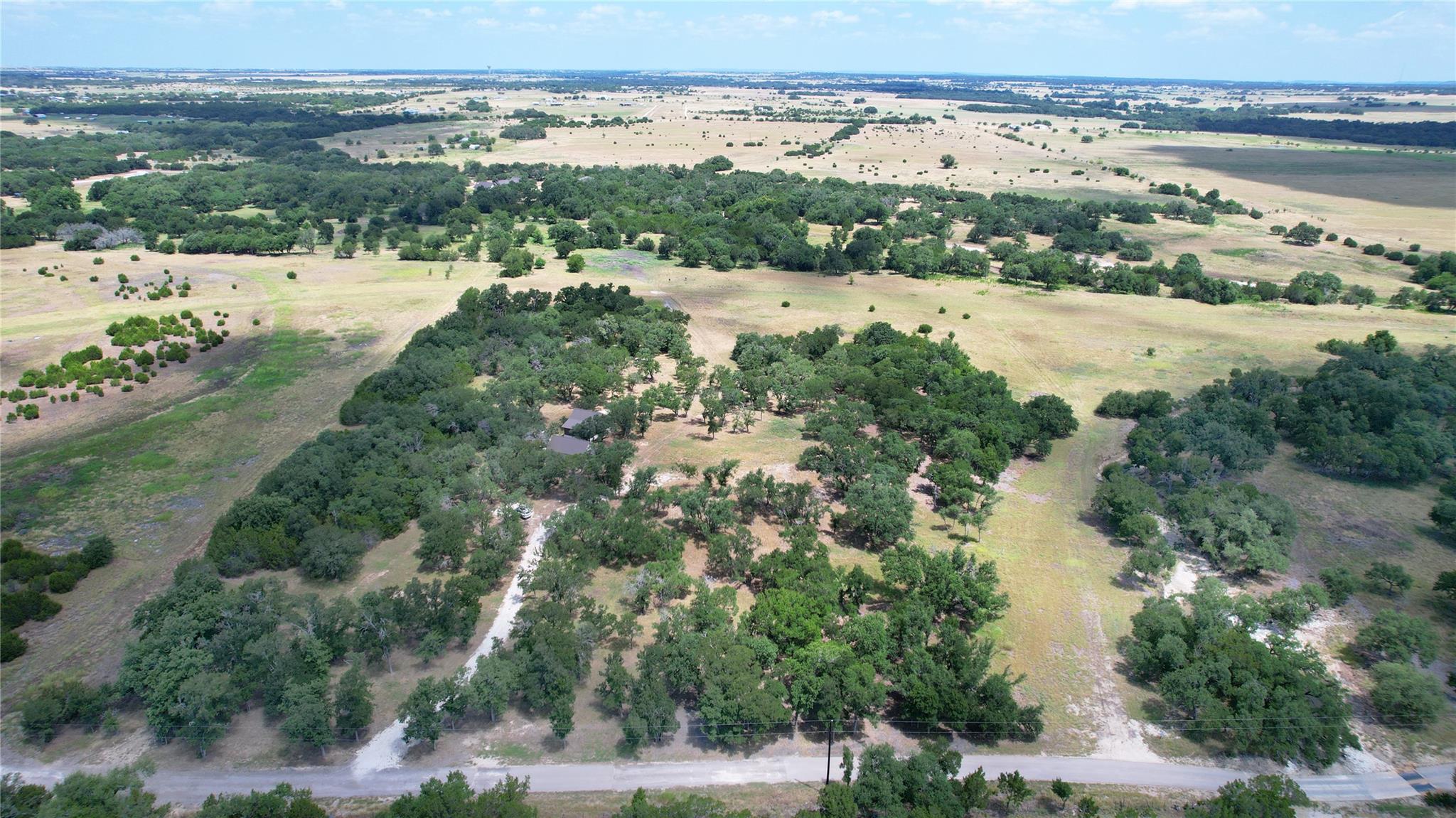 An aerial perspective showcases a vast countrysid