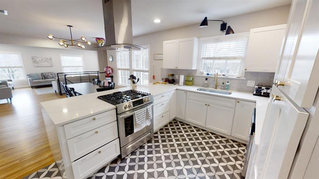 An open kitchen layout flows seamlessly into the 