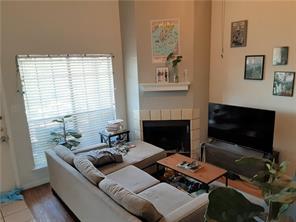 High vaulted ceilings and a classic corner firepl